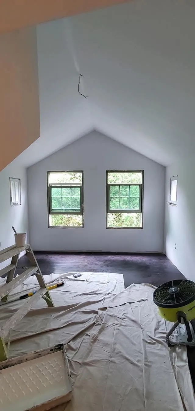 Smooth walls and vaulted ceiling, with trim and fixtures still to follow.